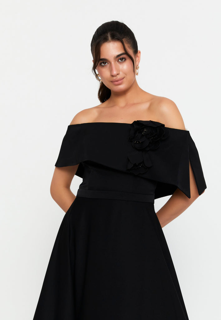 Off-Shoulder Maxi Gown with Floral Accent and Floor-Length Flared Hem